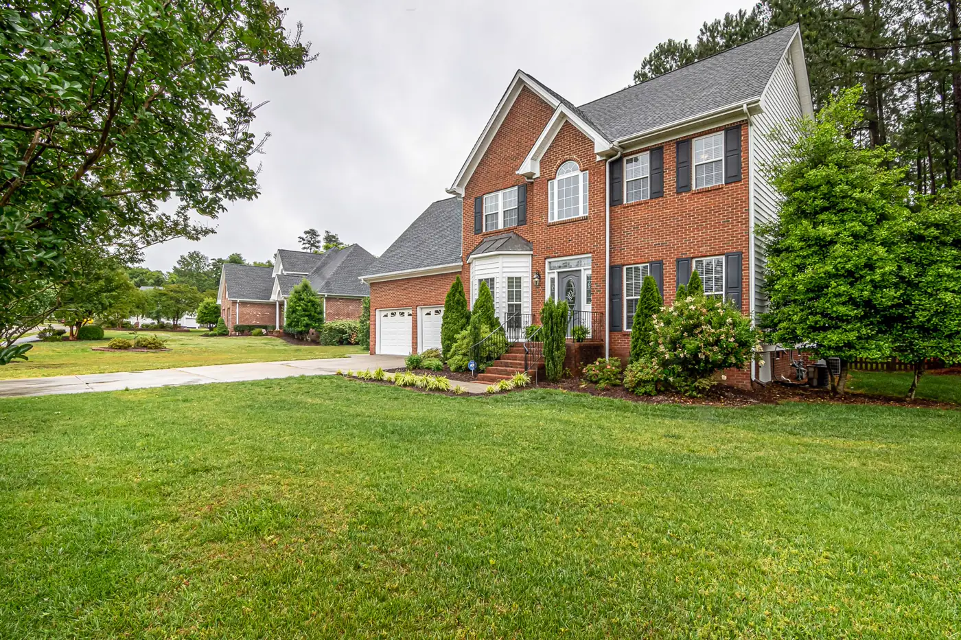 A well-kept single-family home with a freshly installed architectural shingle roof